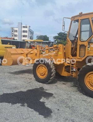 Máy xúc lật CATERPILLAR 910 - 1990