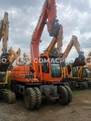 Máy xúc bánh lốp DOOSAN DX140 - 2016