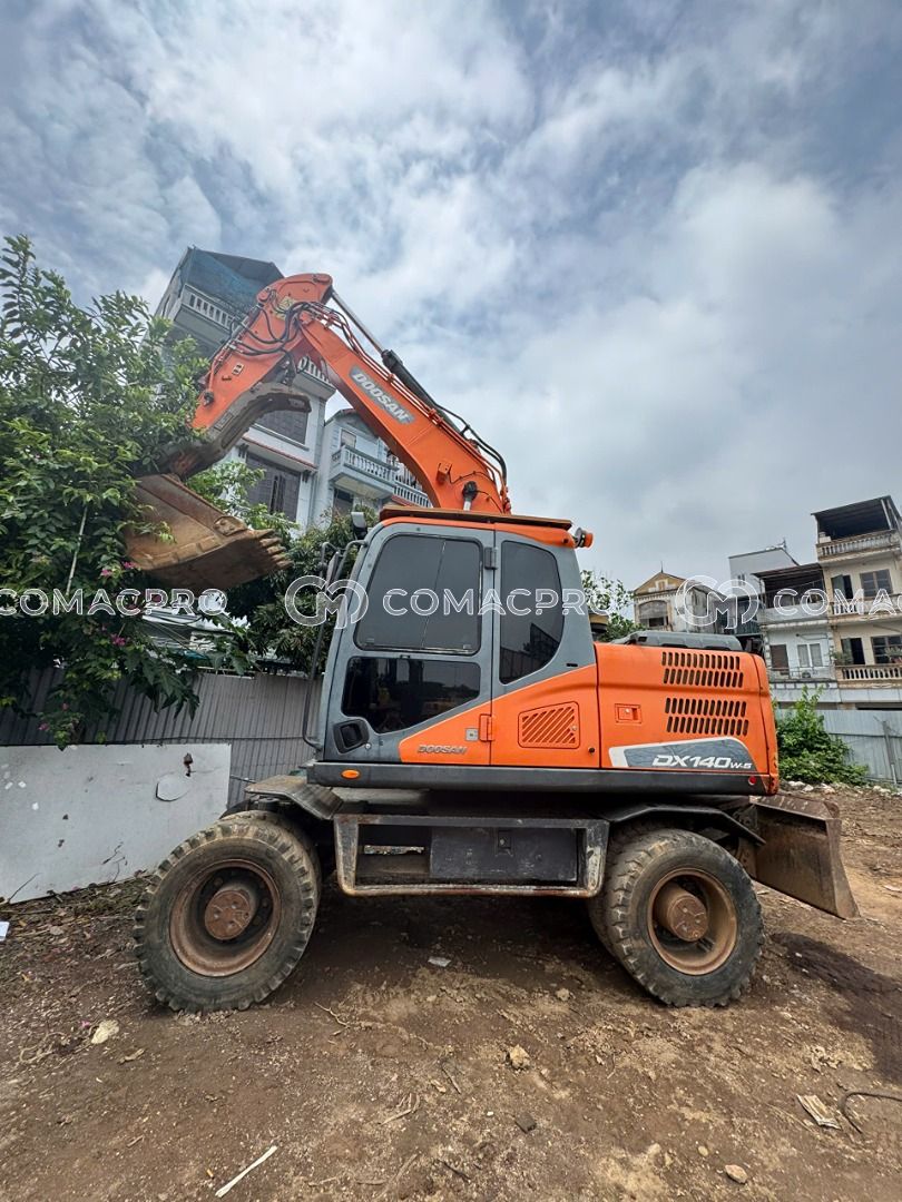 Máy xúc bánh lốp DOOSAN DX140-5 - 2016