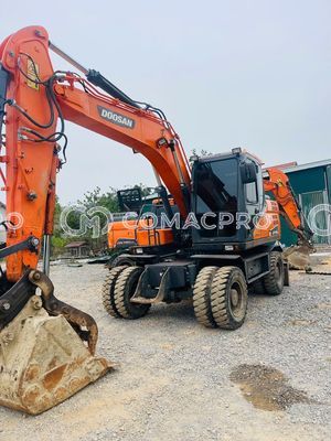 Máy xúc bánh lốp DOOSAN DX 140W - 2016