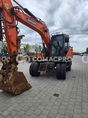 Máy xúc bánh lốp DOOSAN DX140W - 2016