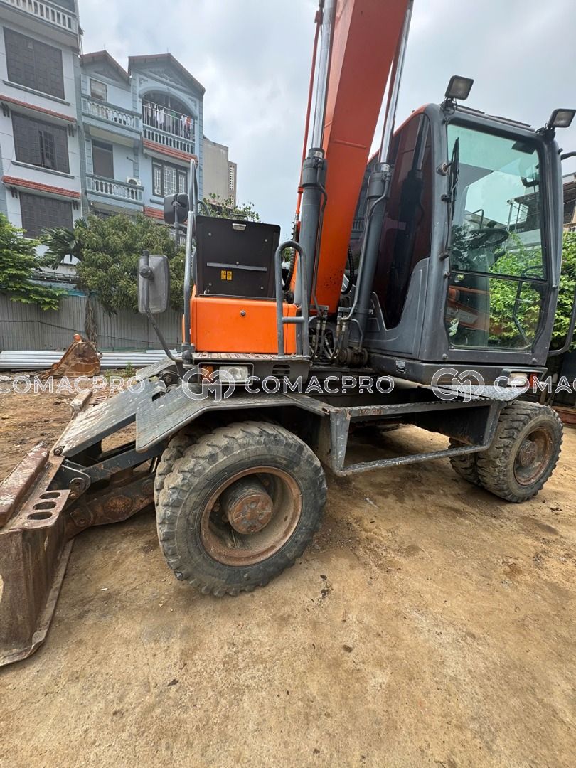 Máy xúc bánh lốp DOOSAN DX 140W-5 - 2016
